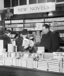 Perusing books at Selfridges 1942